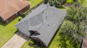 Overhead photo of a new Malarkey Products roof in weathered wood installed by college station roofing contractor, Sustainable Roofing